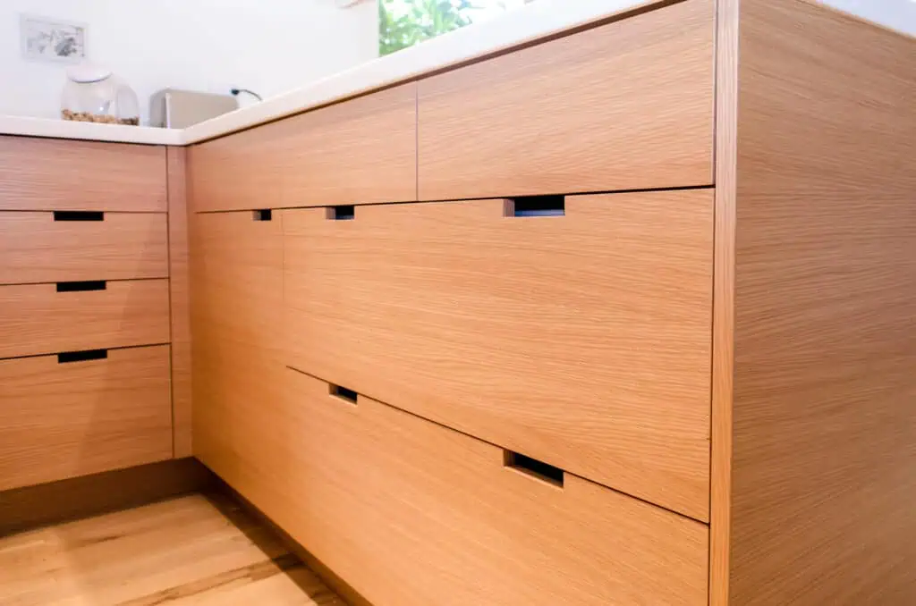 Custom open shelving on kitchen peninsula