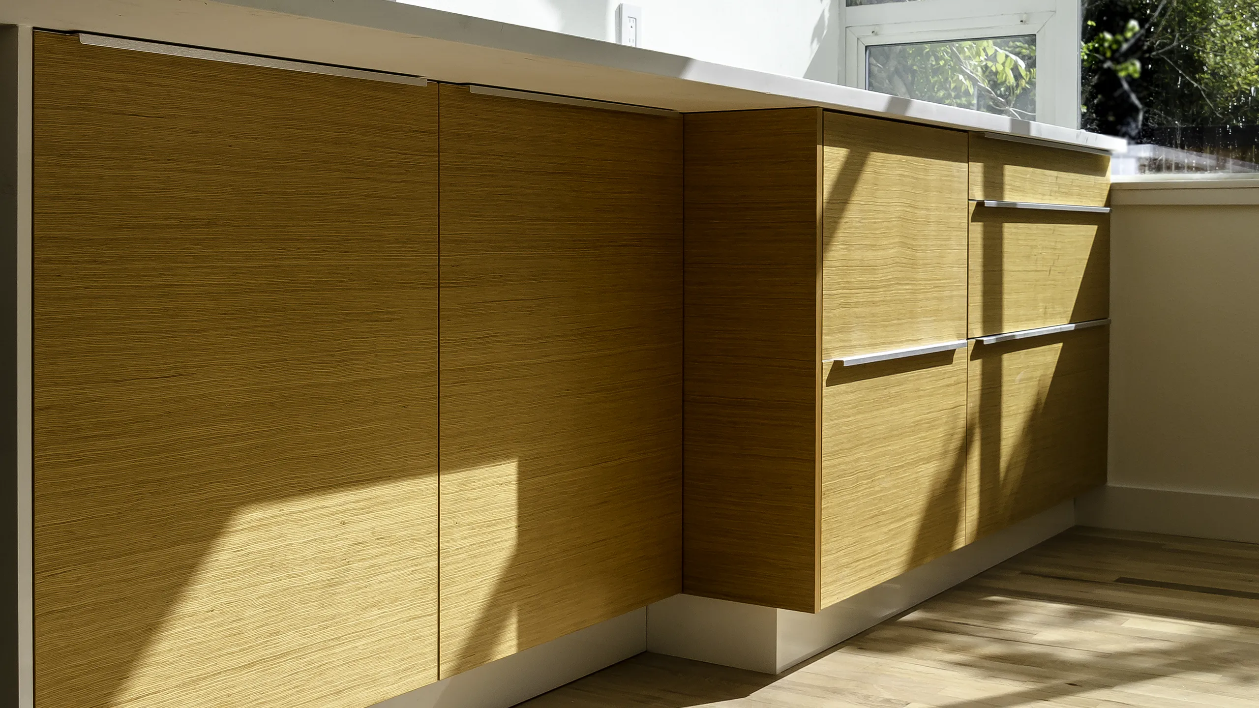 Close-up detail of custom fir cabinet doors on IKEA kitchen cabinets — Issaquah kitchen remodel by NW Homeworks