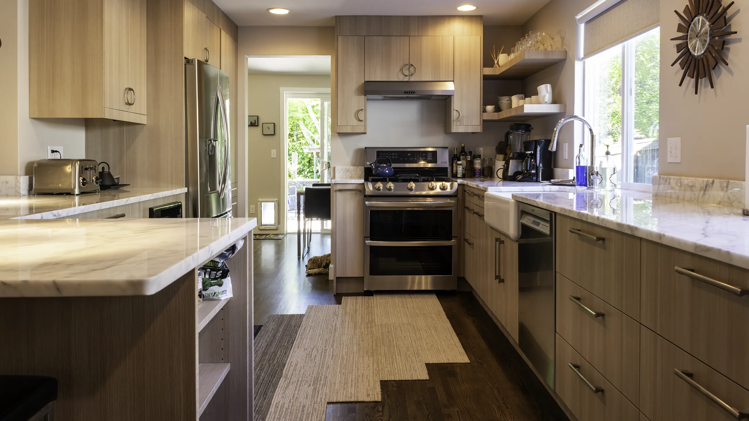 Bellevue kitchen remodel with modern cabinetry, stainless appliances, and marble countertops