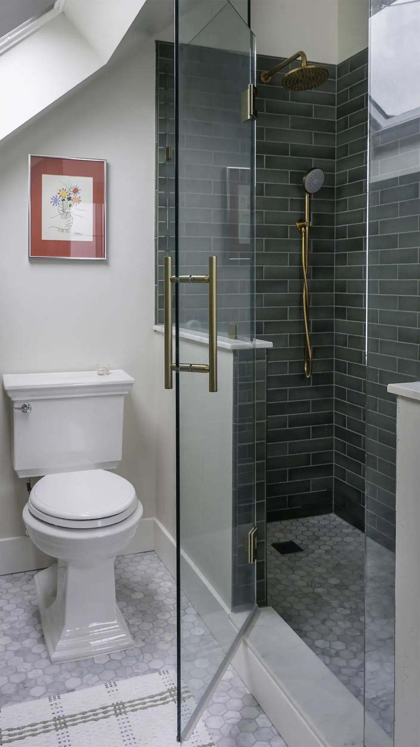 Completed Maple Leaf master bath with green tile and skylight