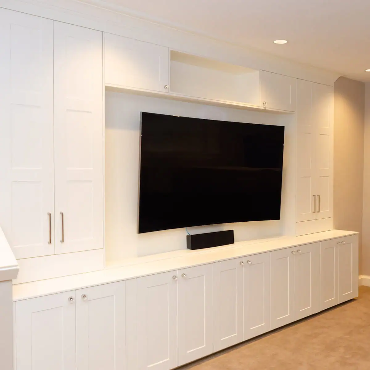 Custom media center built with IKEA cabinets