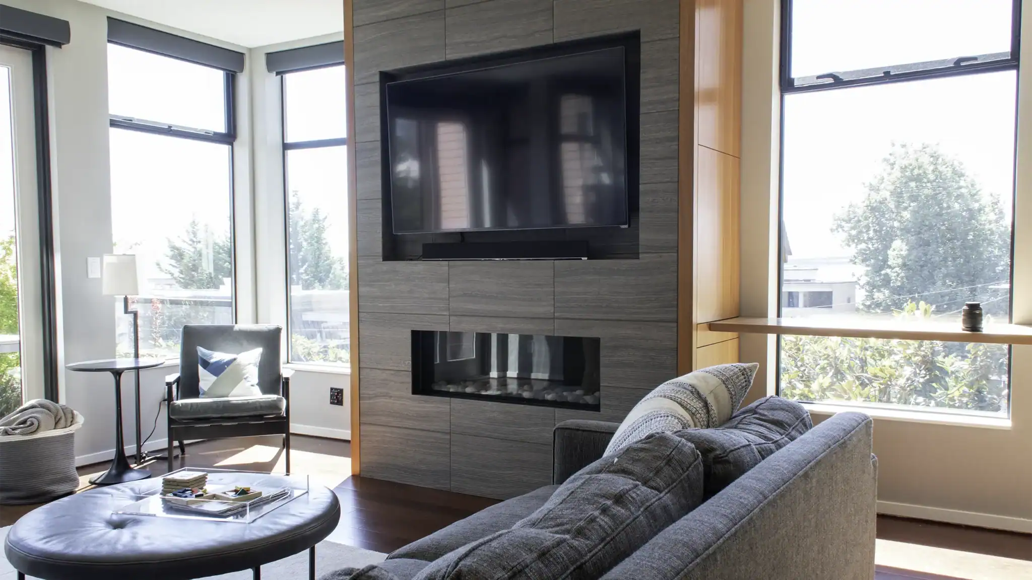 Queen Anne fireplace feature wall with tile surround and custom mahogany cabinets