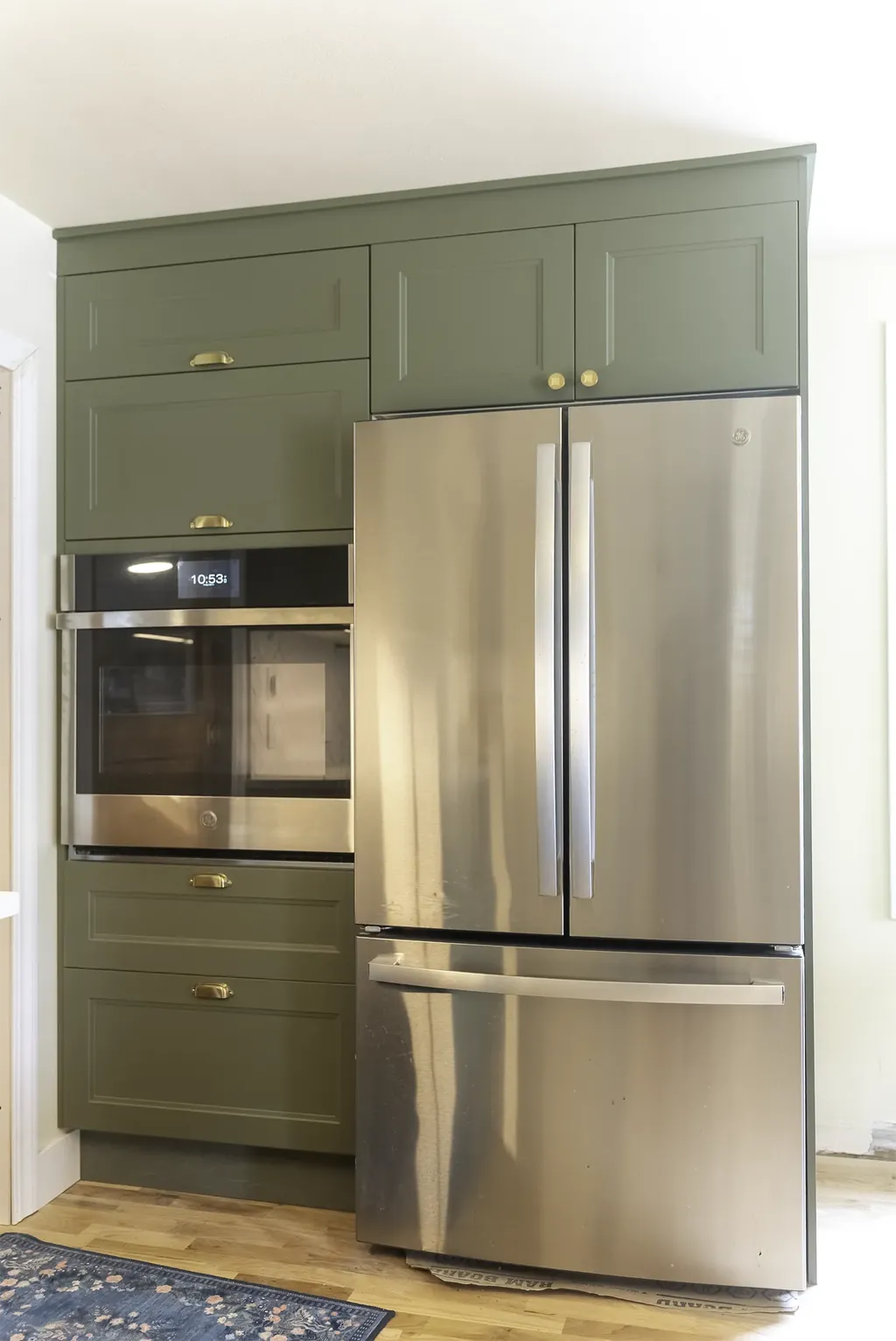 West Seattle IKEA kitchen remodel cabinet wall with a built-in oven and counter-depth fridge