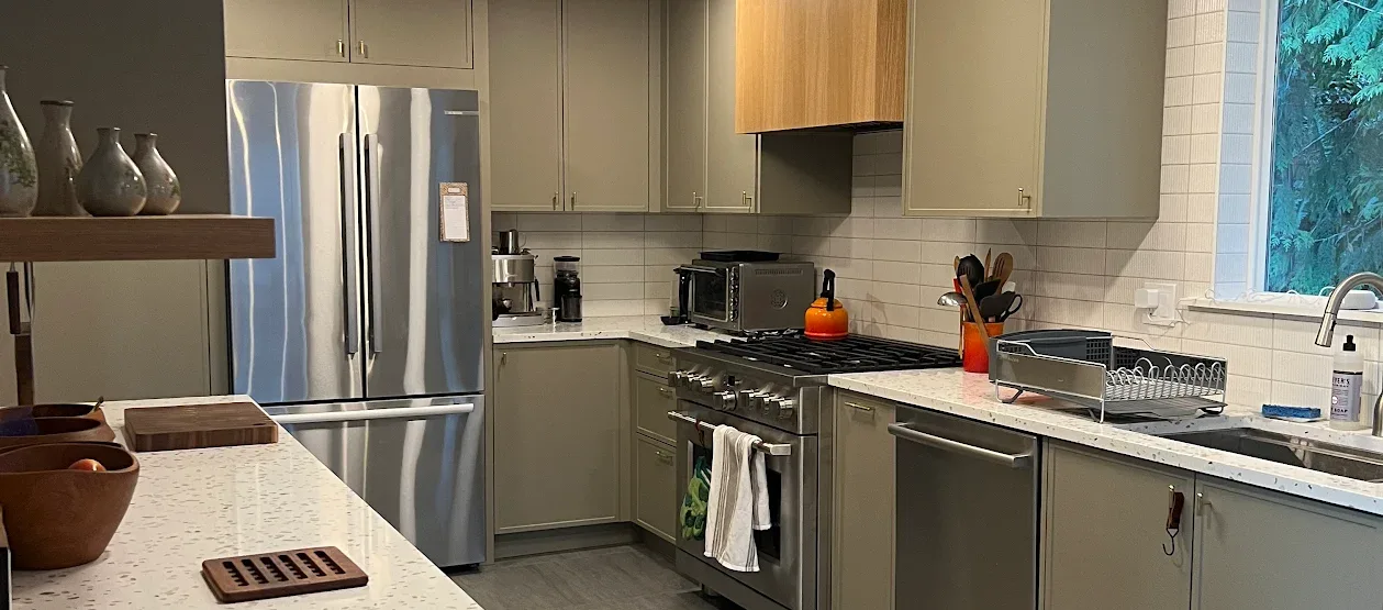 Seattle studs-out kitchen remodel by NW Homeworks with wall removal and new window addition