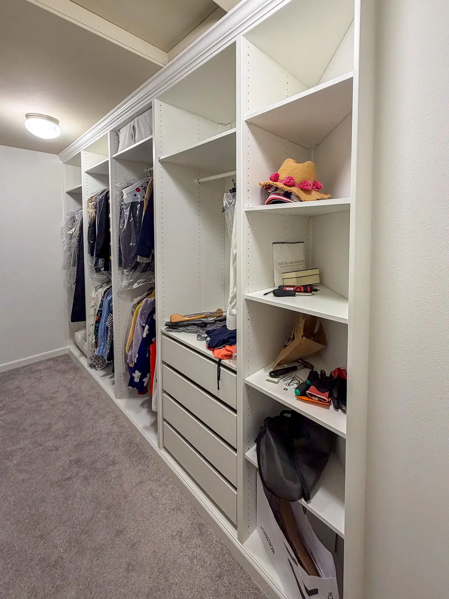 Closet shelving custom cut to follow a 45 degree angled wall into the corner
