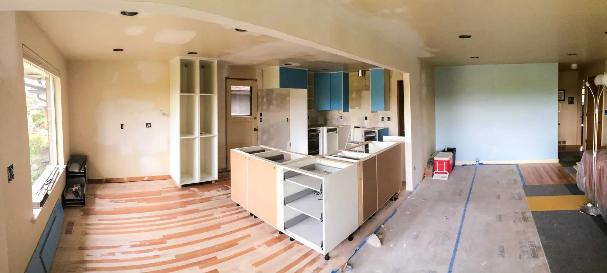 IKEA kitchen cabinets being installed in a Seattle home