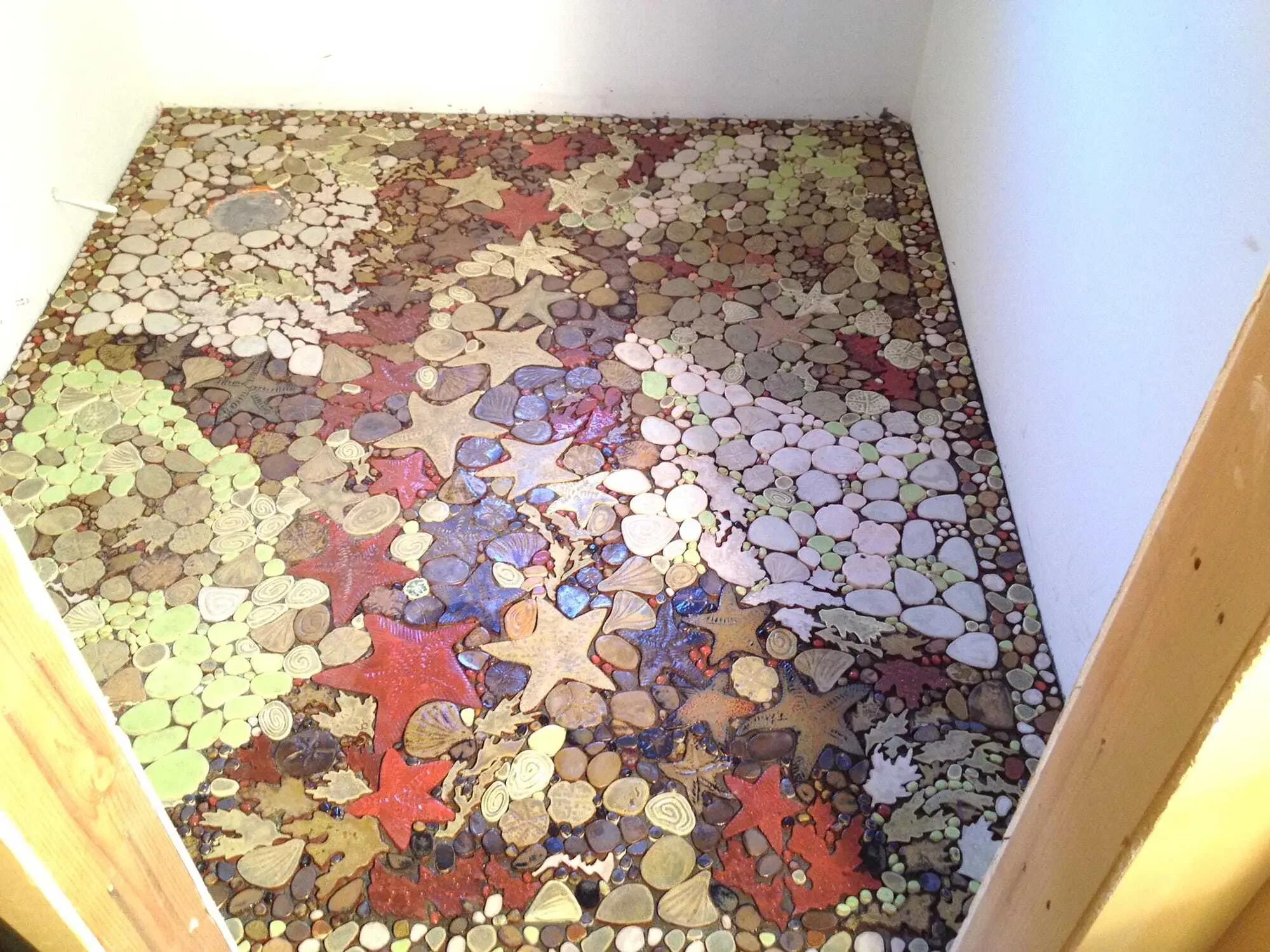 Tile mosaic is installed and ready for grout