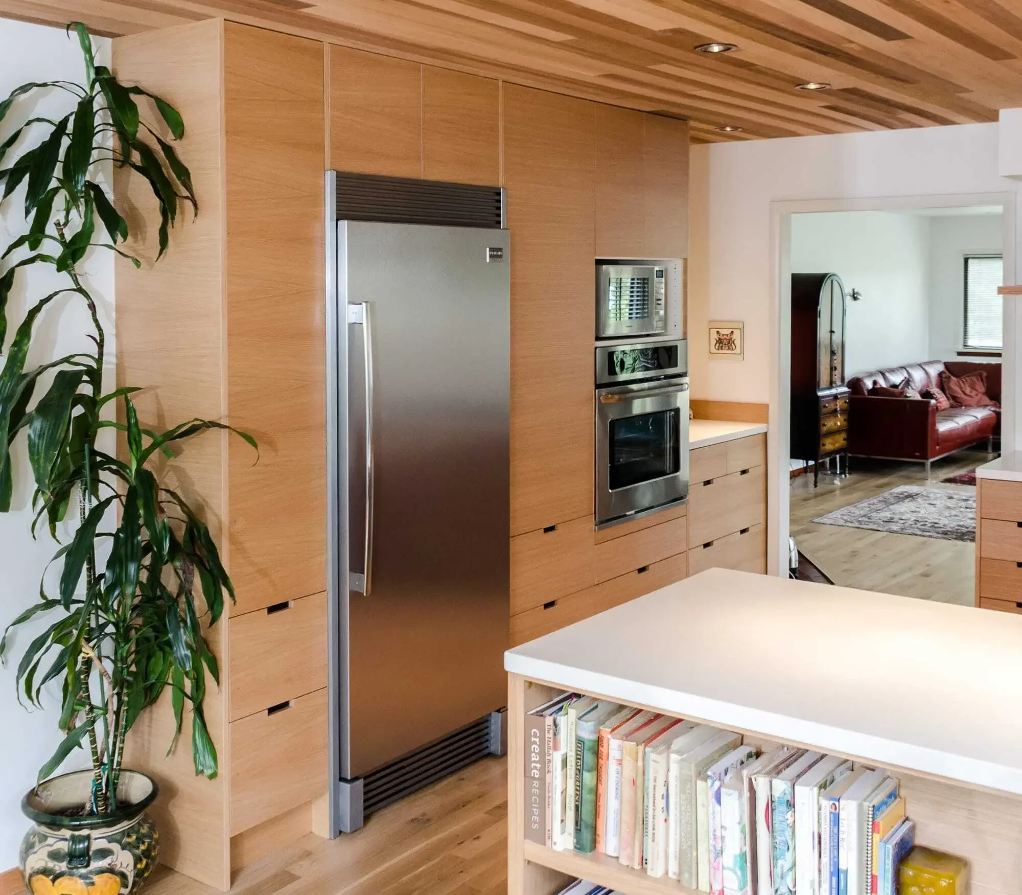 Moving wall opens up walkway to kitchen