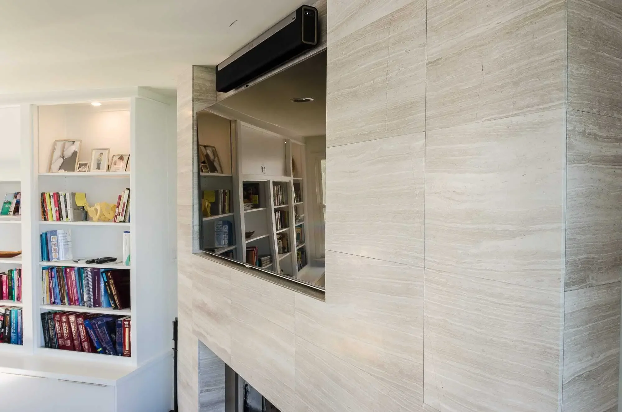 Tile fireplace surround with recessed TV and soundbar