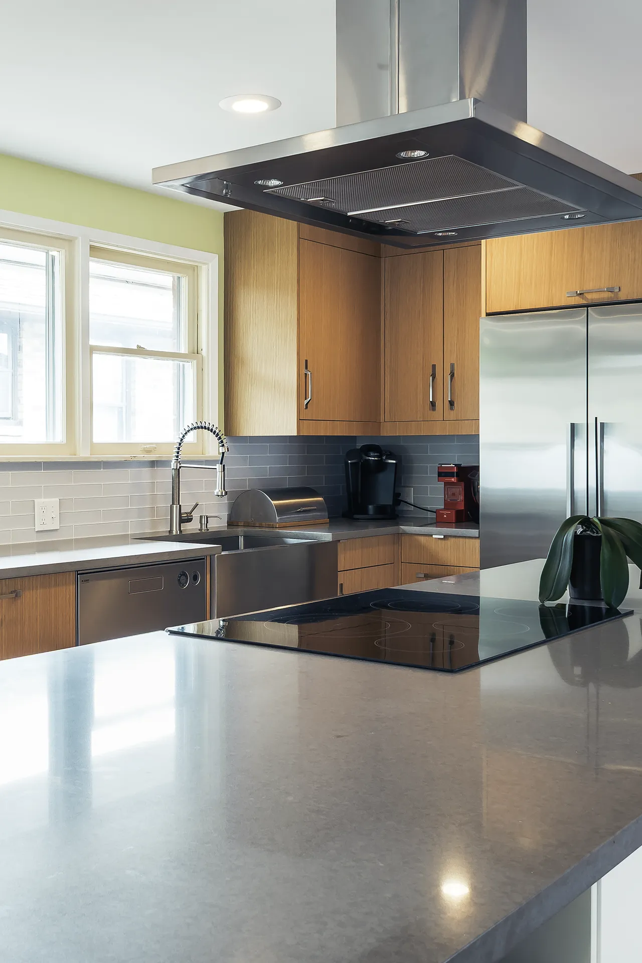 Custom quartz countertop with cooktop on IKEA kitchen cabinets