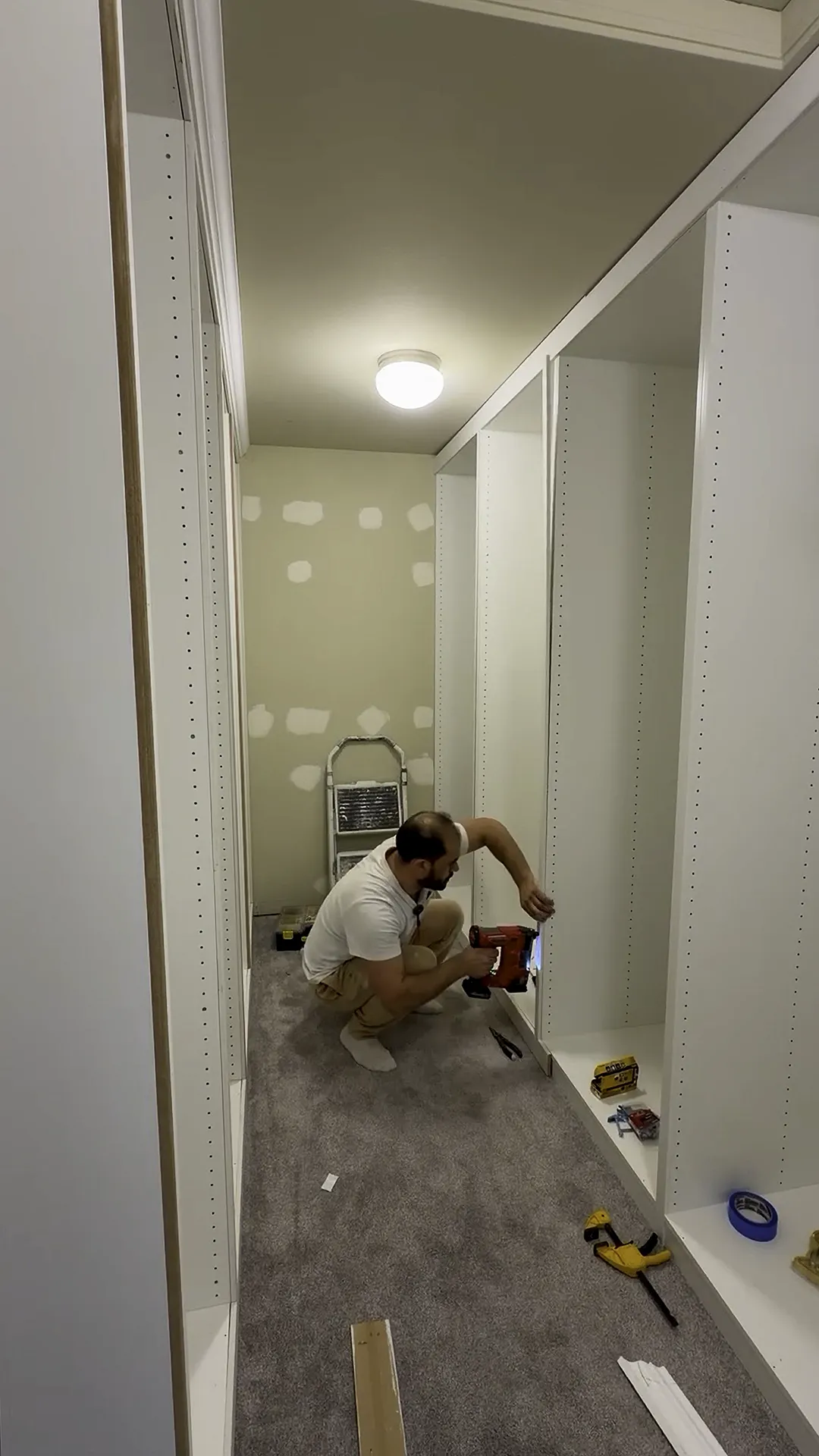 Adding filler strips and trim molding to IKEA PAX units to create a built-in look